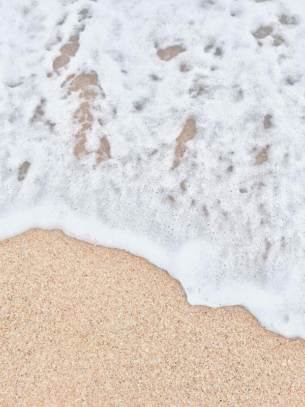 Soft light hitting a minimalist sculpture of a wave